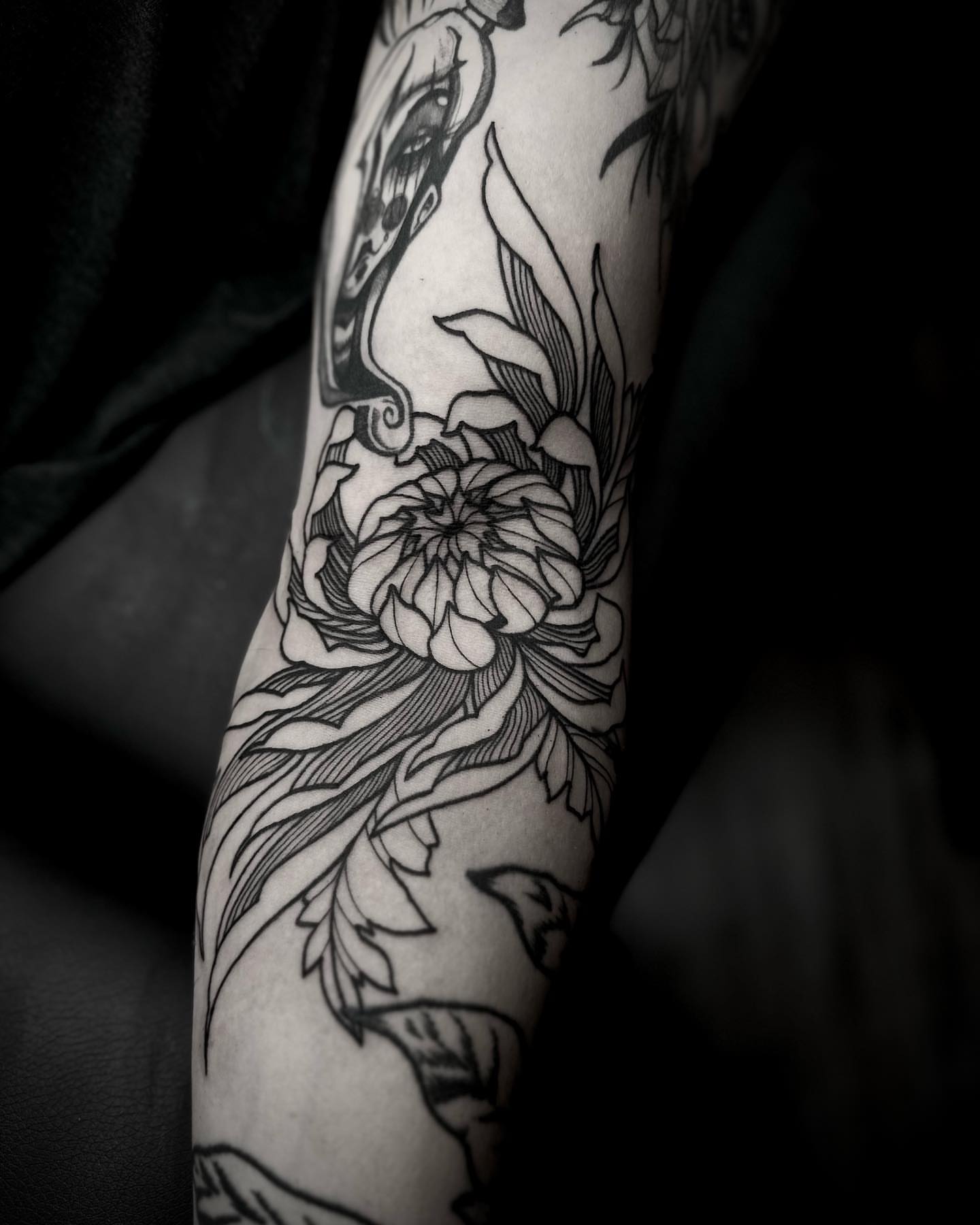 Peony and bird black and grey tattoo on the forearm by t a y l o r