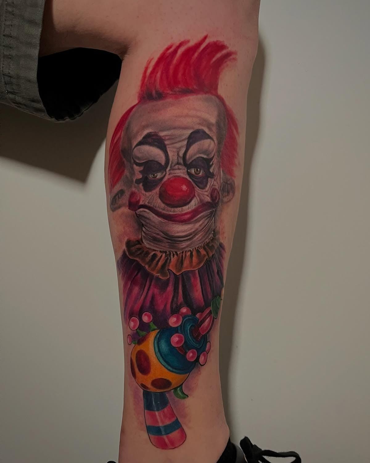 Clown realism tattoo on the forearm by Elidia Veliz