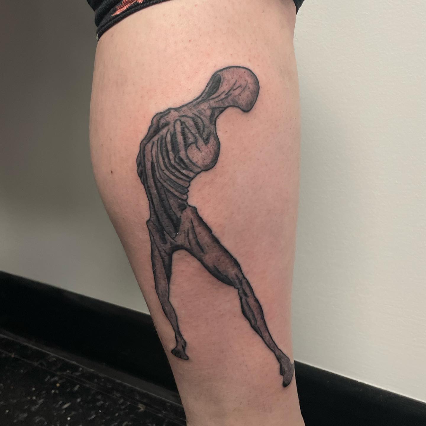 Tattoo by @weaponized_onion — black_and_grey
