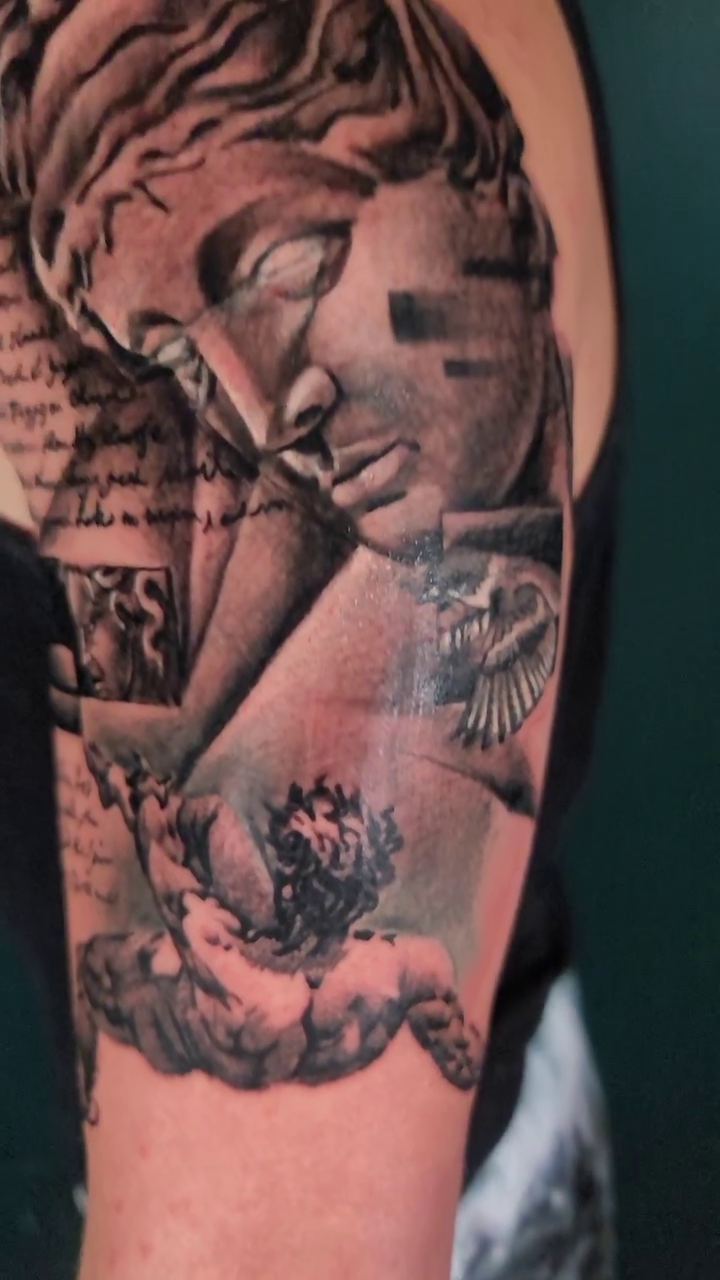 Tattoo by @johnniericotattoos — realism, black_and_grey