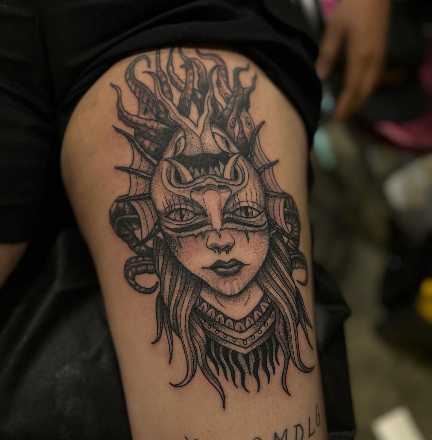 Medusa dotwork tattoo on the thigh by Morgan Jones