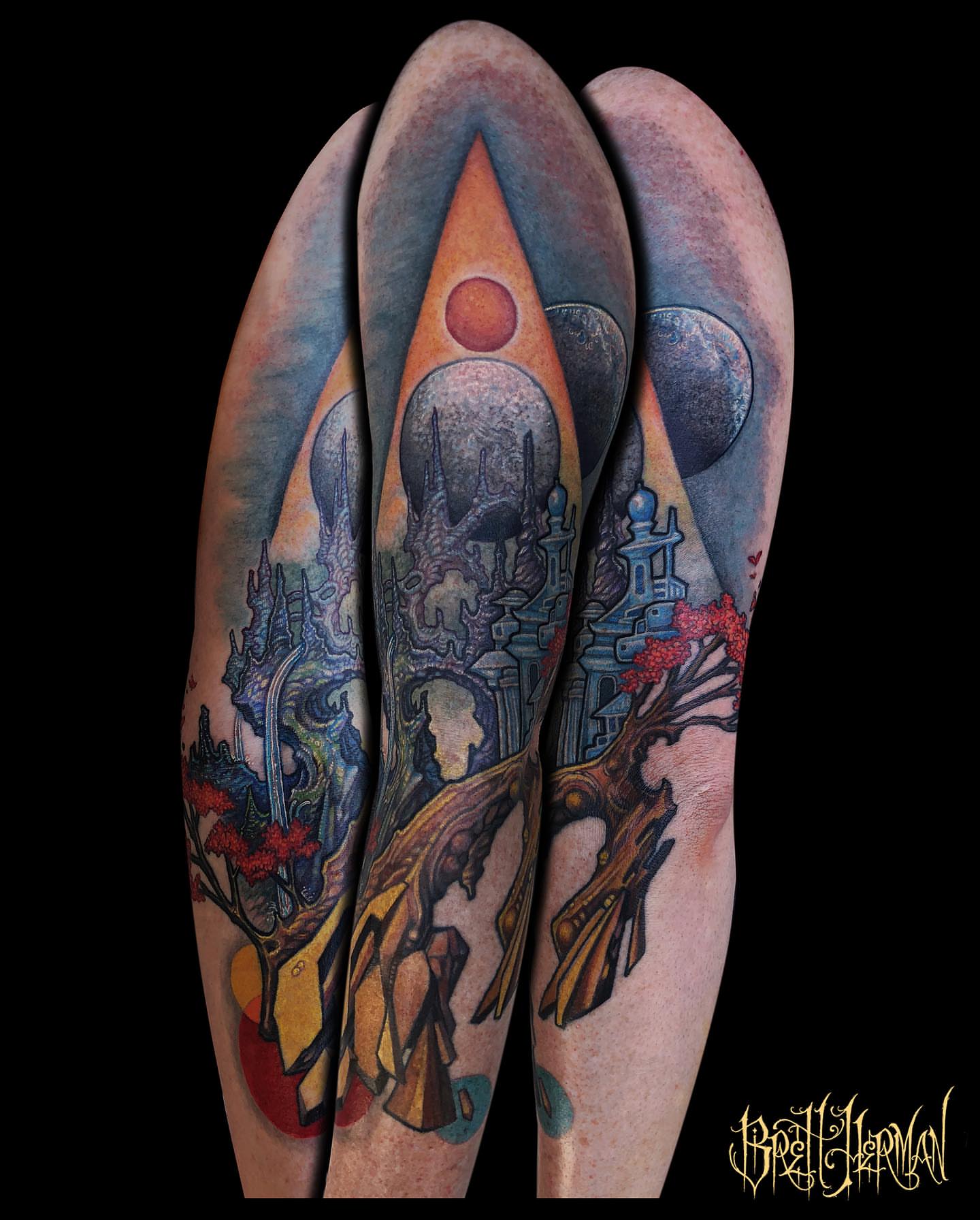 Fantasy landscape surrealism tattoo on the forearm by Brett Herman, Denver, Colorado