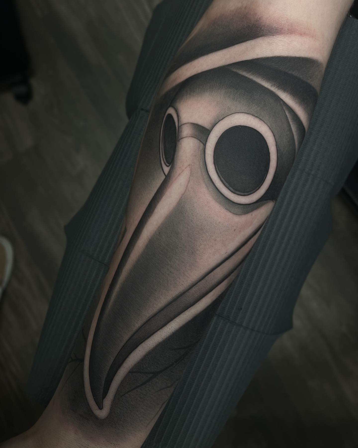 Plague doctor mask realism tattoo on the forearm by Madison Ast Tattoo