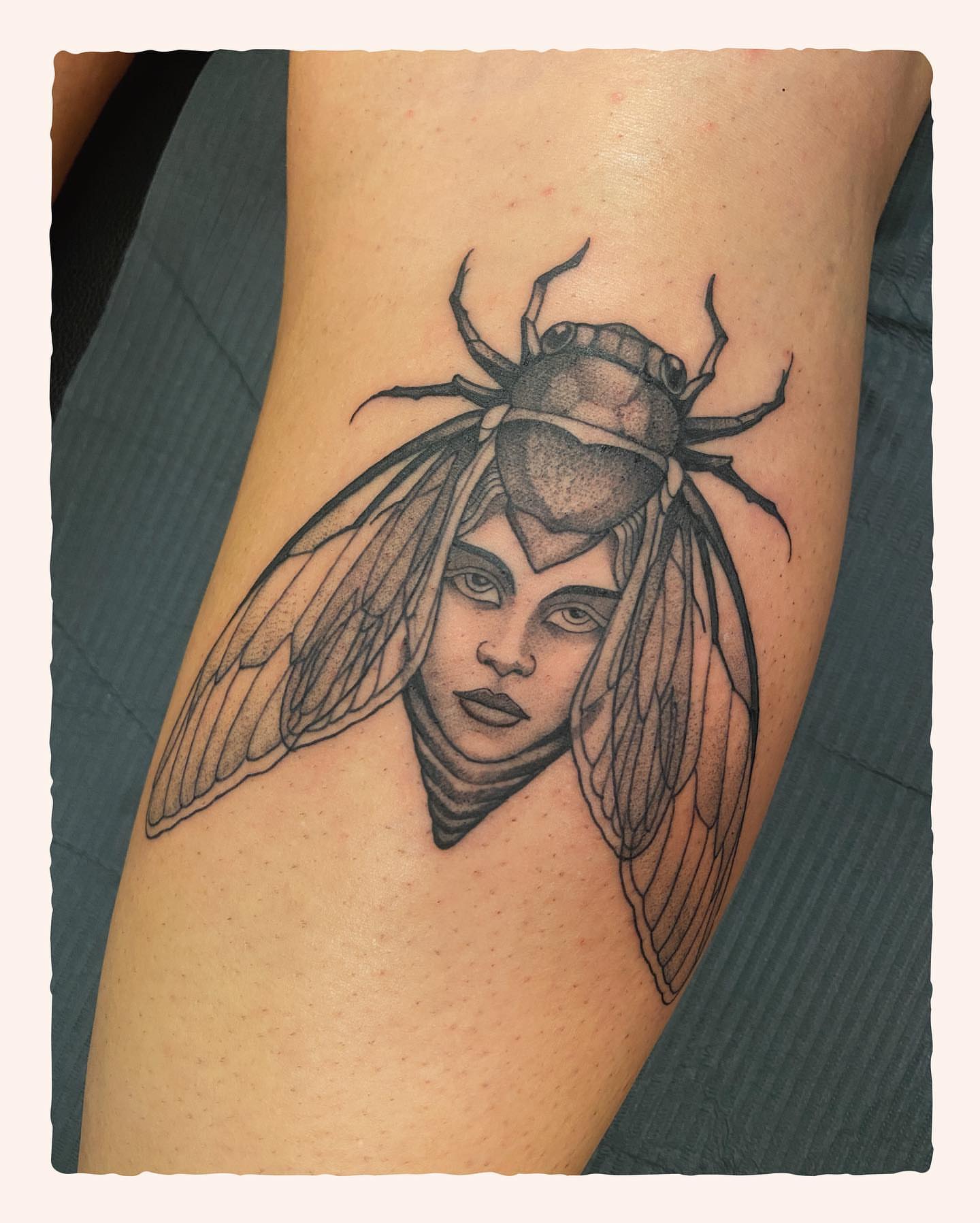 Woman with cicada wings realism tattoo on the thigh by Tattoo Artist