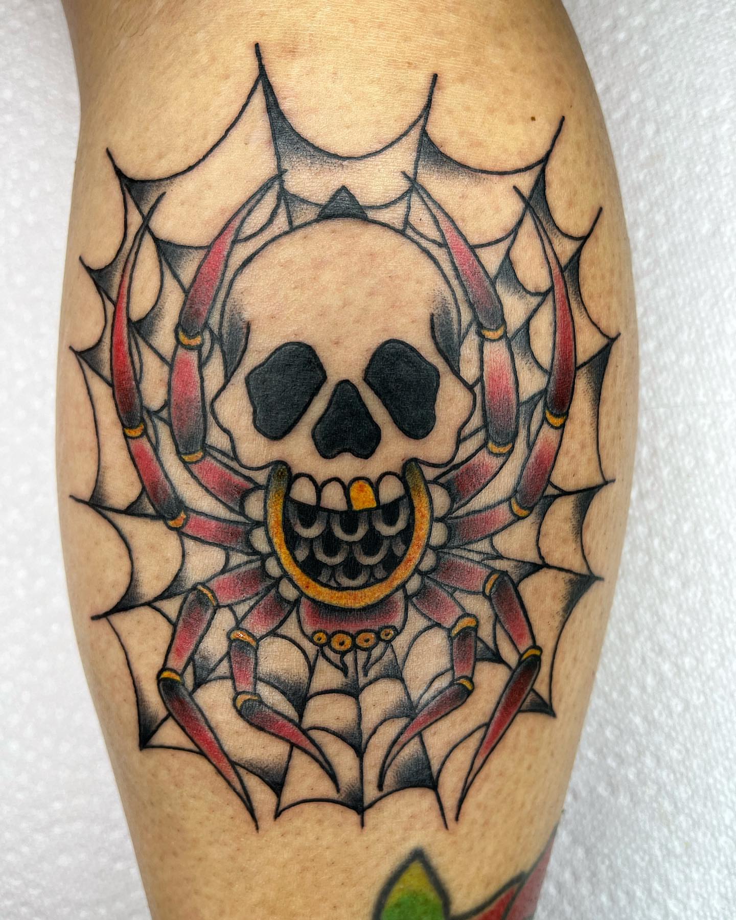 Skull and spider American traditional tattoo on the forearm by Pedroux M.