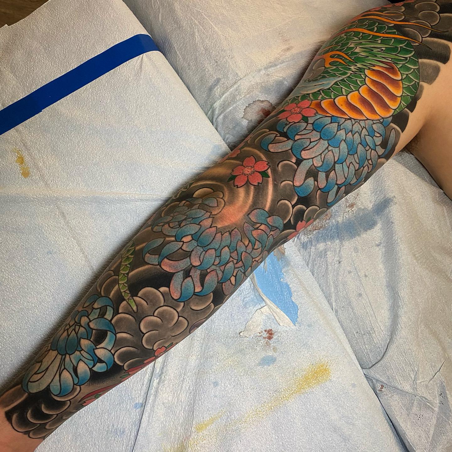 Floral pattern japanese irezumi tattoo on the forearm by Erick Lynch, Cambridge, Massachusetts