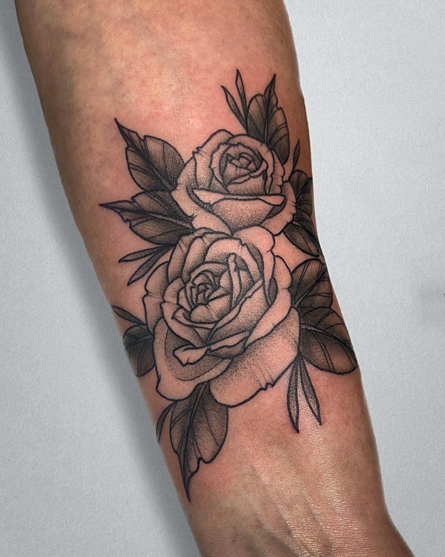 Roses black and grey tattoo on the forearm by Mallory Miller π³οΈβπ Eugene
