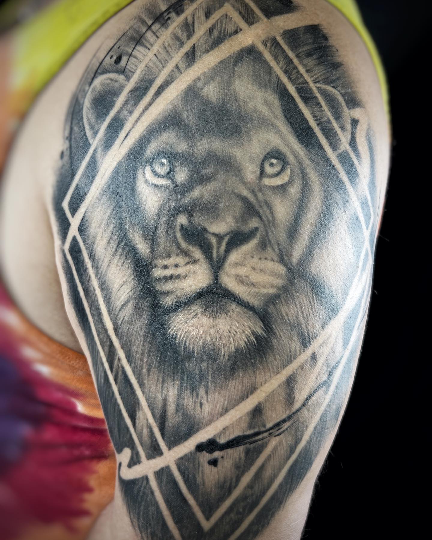 Lion realism tattoo on the shoulder by Tattoos by Hanna, Farmington Hills, Michigan