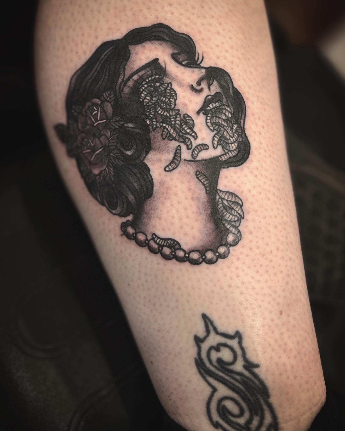 Woman with roses dotwork tattoo on the forearm by Samantha C, Bremerton, Washington