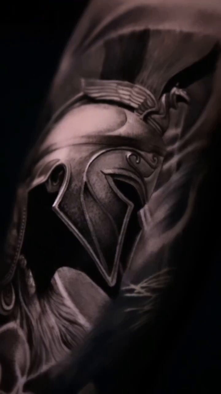 Spartan helmet realism tattoo by Luis Bravo