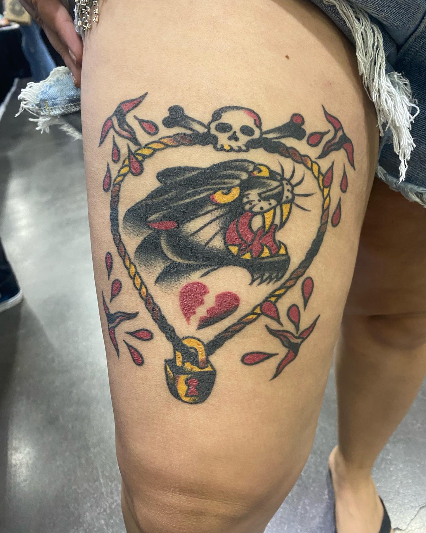Panther and skull American traditional tattoo on the thigh by Alan Pham, San Jose, California