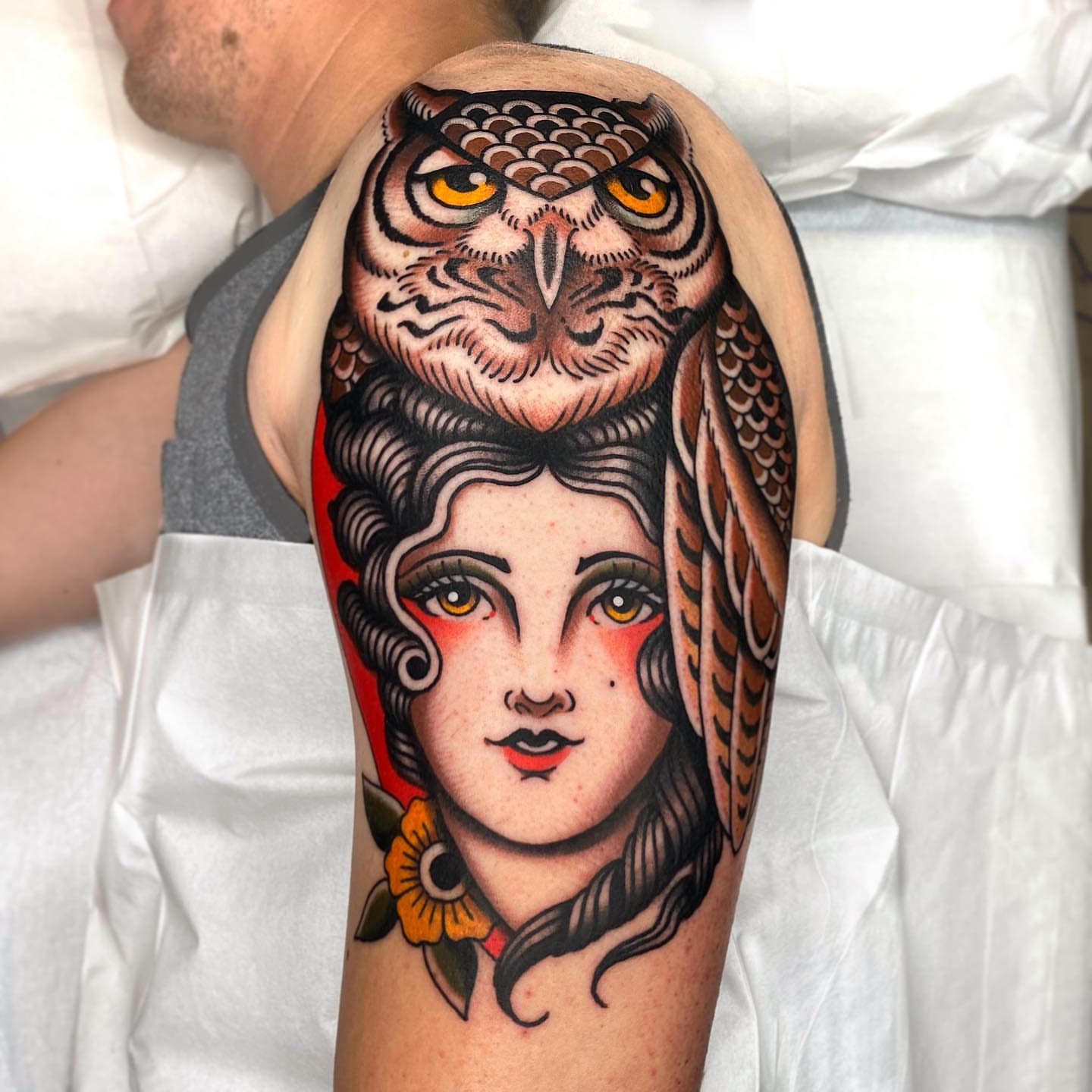 Owl and woman American traditional tattoo on the forearm by Wes Hoffman