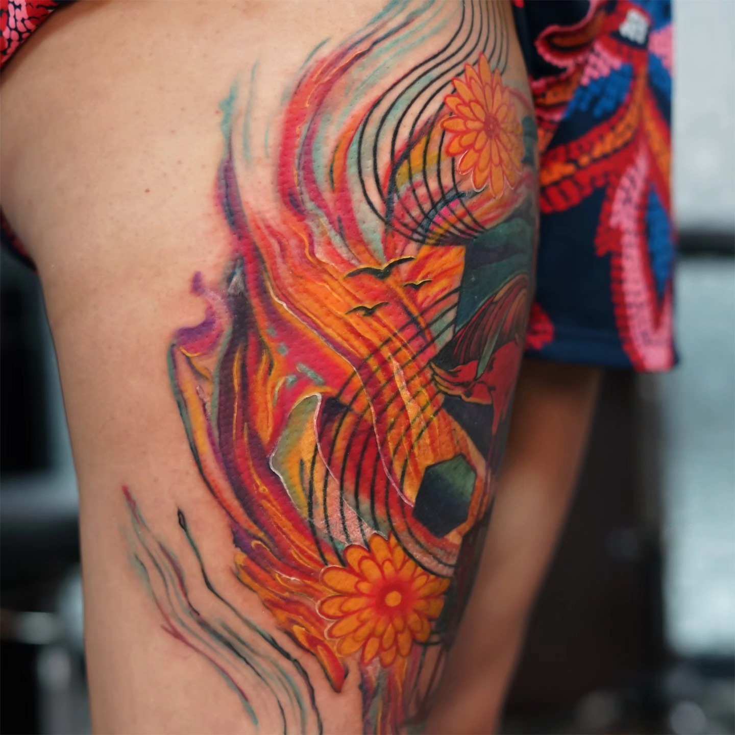 Floral and abstract new school tattoo on the upper arm by ＳＥＲＧＥＩ ＪＡＥＲ [ˈʤeɪər]