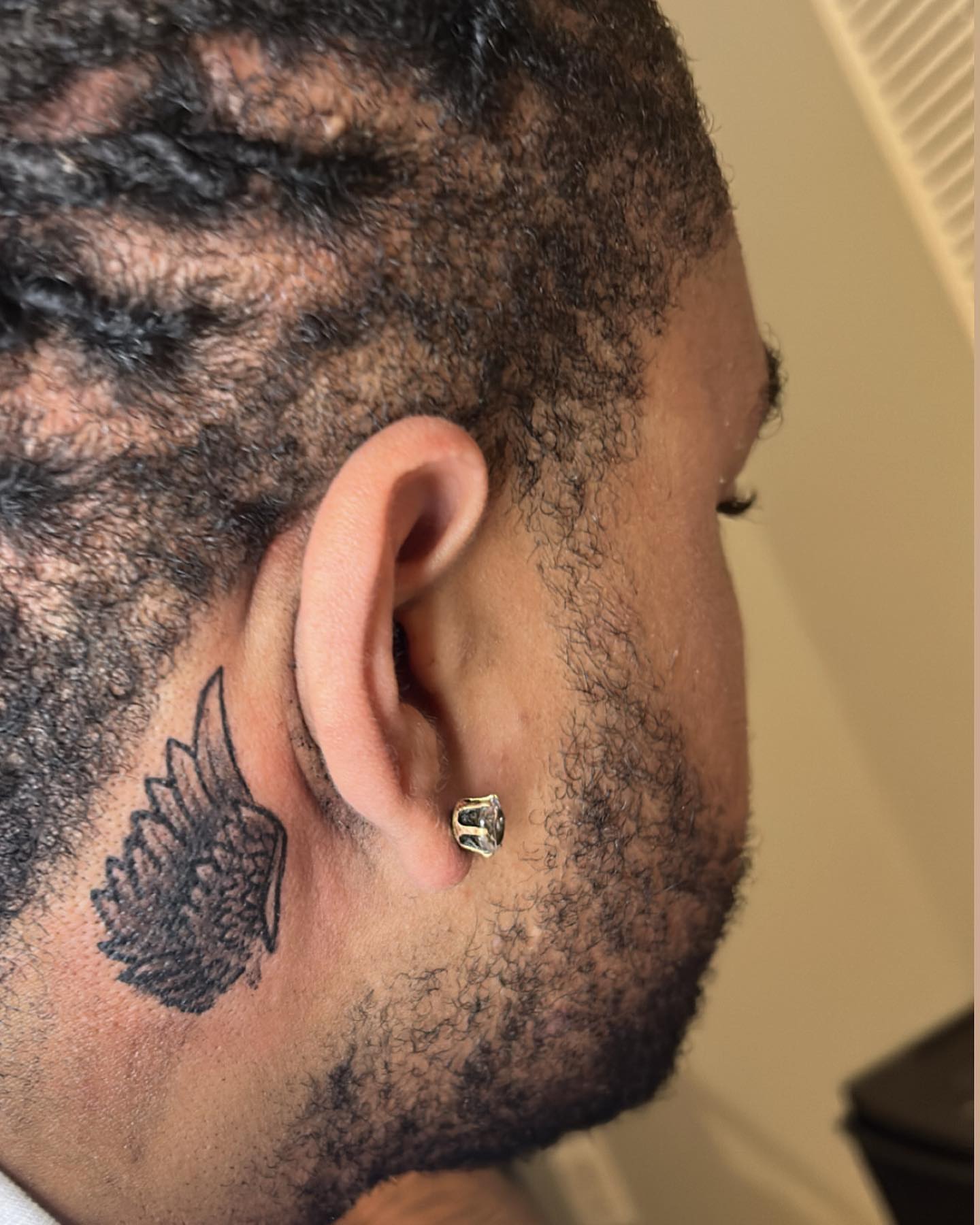 Wing American traditional tattoo on the neck by ๐ฆ