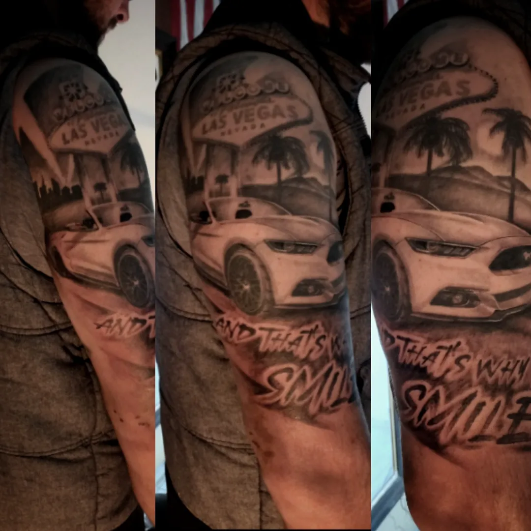 Car and Las Vegas sign realism tattoo on the forearm by Pod Viñes