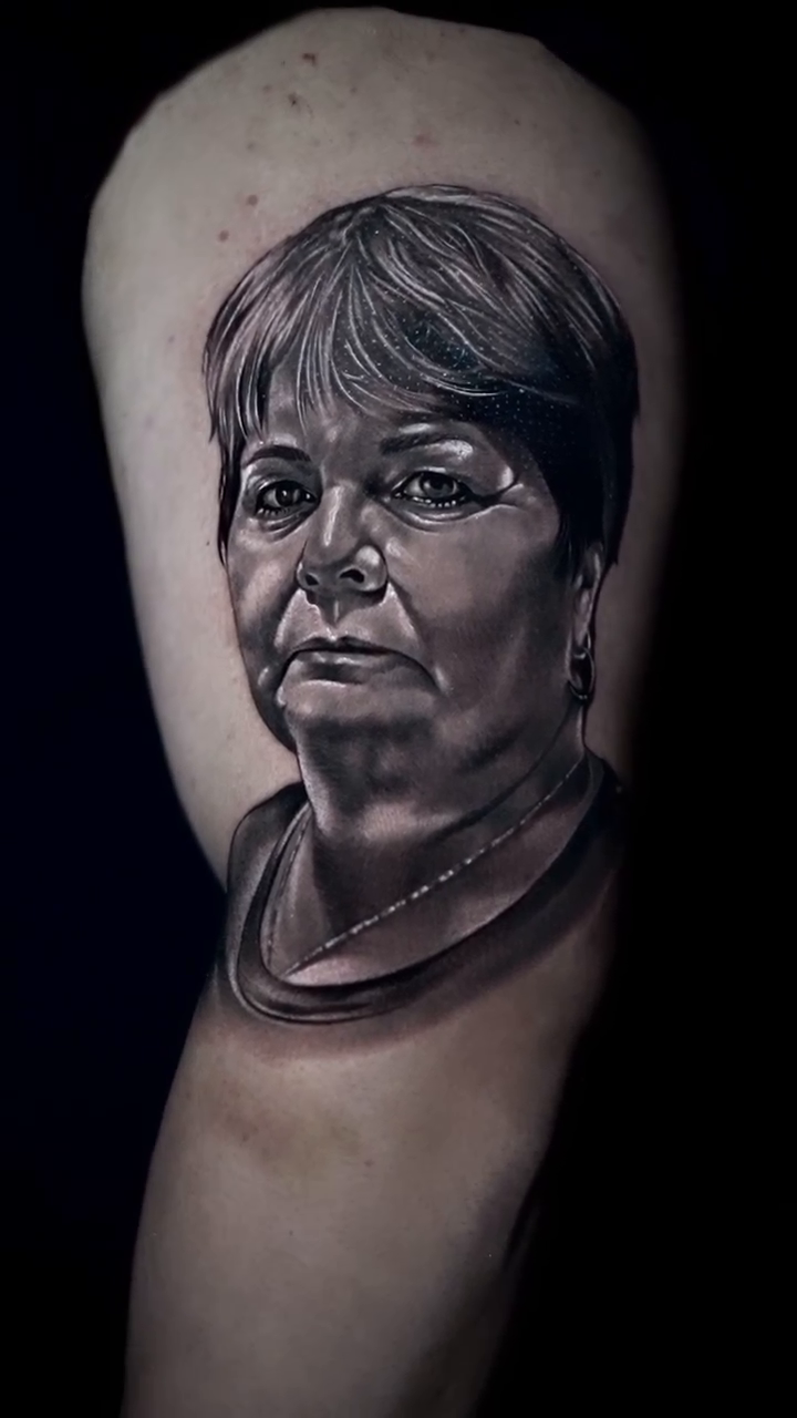 Portrait of a woman realism tattoo by Juan Ortega