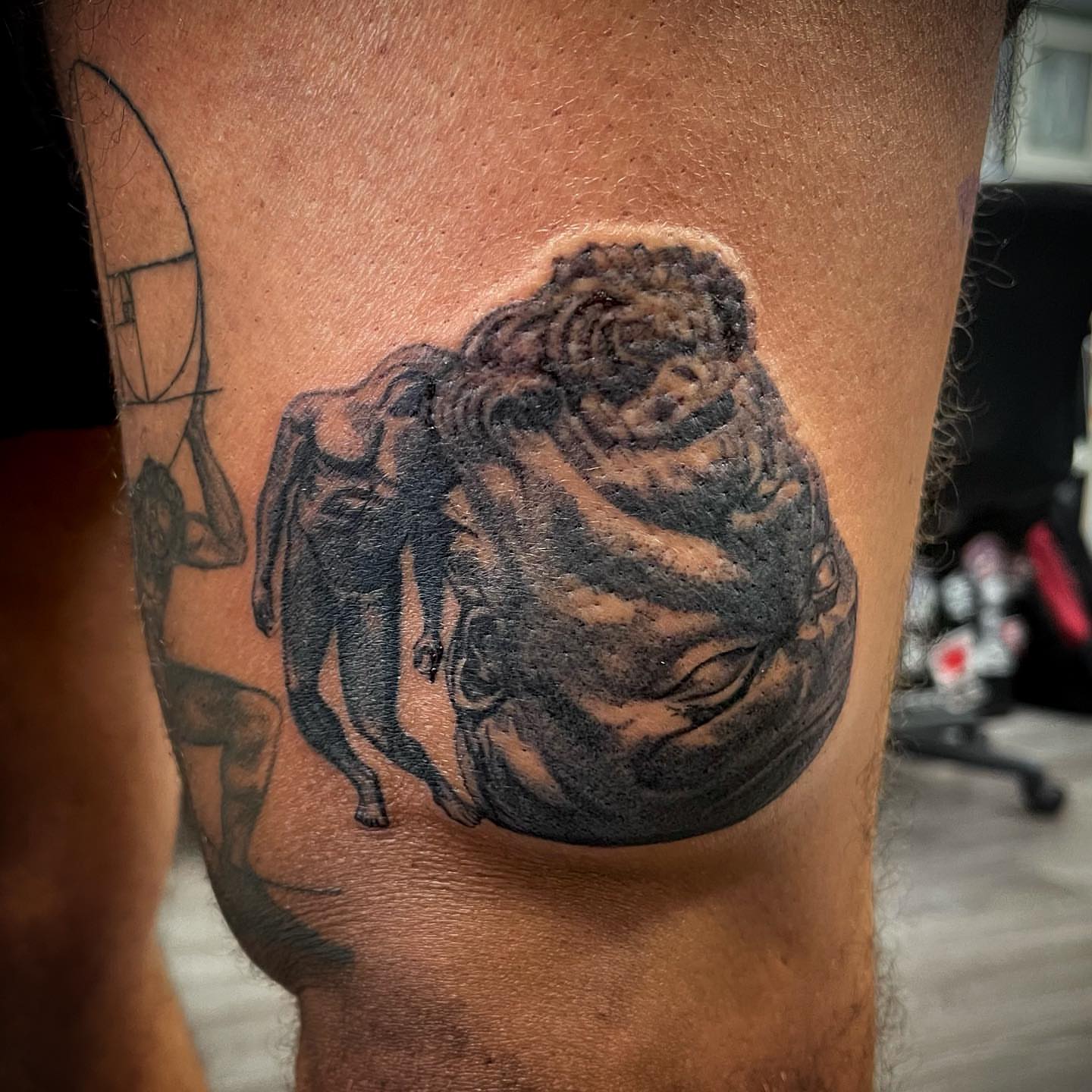 Bull and angel black and grey tattoo on the thigh by MR