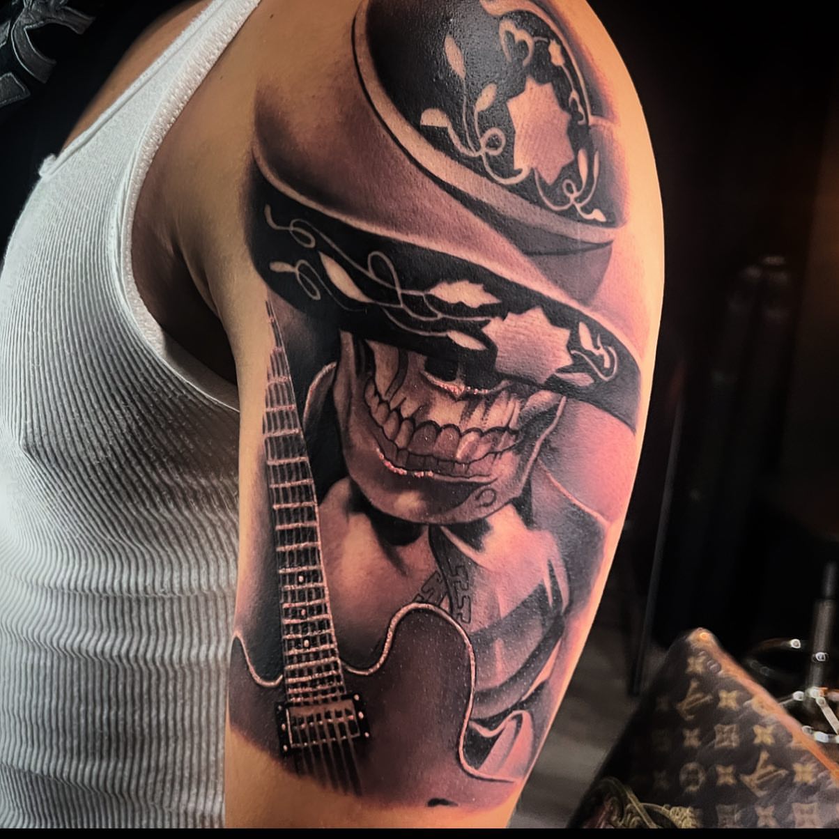 Tattoo by @juliocalderonart — dark_realism, black_and_grey
