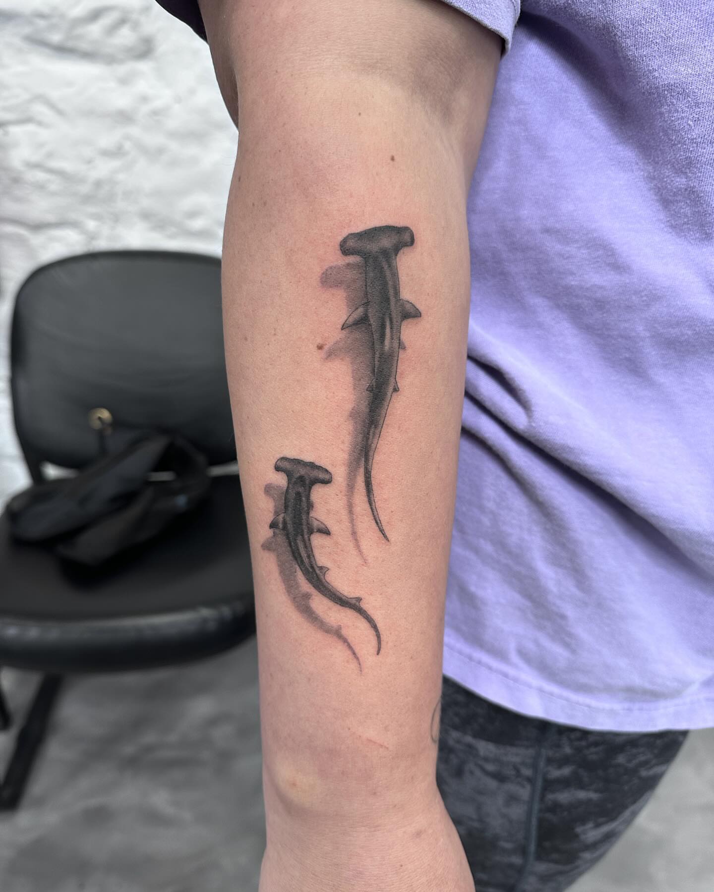 Hammerhead sharks black and grey tattoo on the forearm by Blake Owens, Nashville, Tennessee