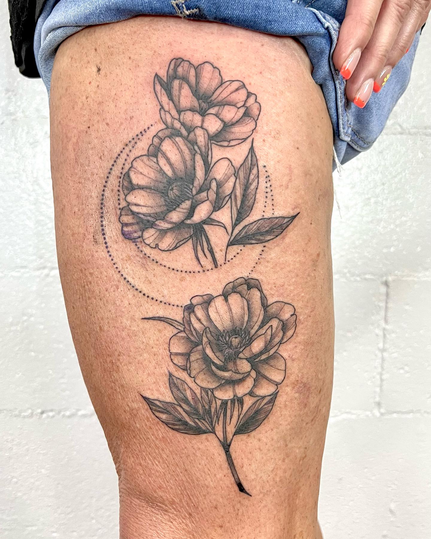 Peony flowers dotwork tattoo on the thigh by Drew Foster, Toledo, Ohio