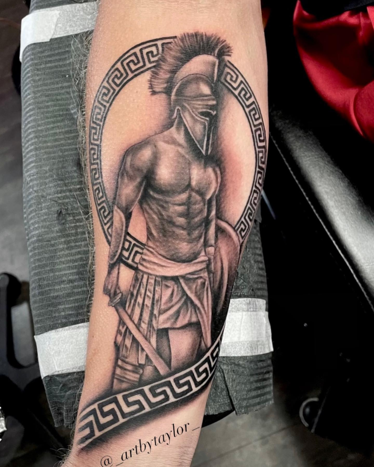 Muscular spartan warrior realism tattoo on the forearm by Taylor✍🏽️