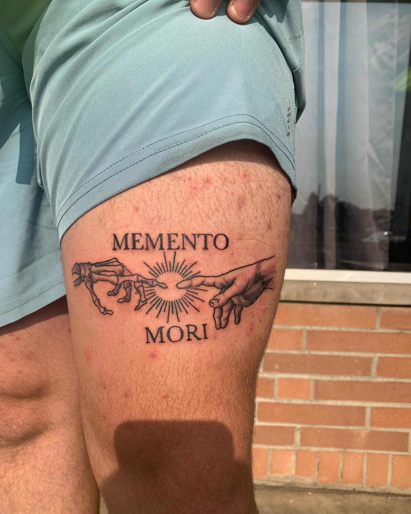 Memento Mori black and grey tattoo on the thigh by kylie