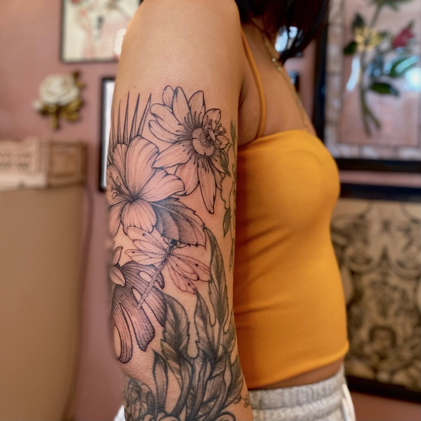 Floral arrangement black and grey tattoo on the forearm by 𝘉𝘢𝘺 𝘈𝘳𝘦𝘢 𝘛𝘢𝘵𝘵𝘰𝘰 𝘈𝘳𝘵𝘪𝘴𝘵, Oakland, California