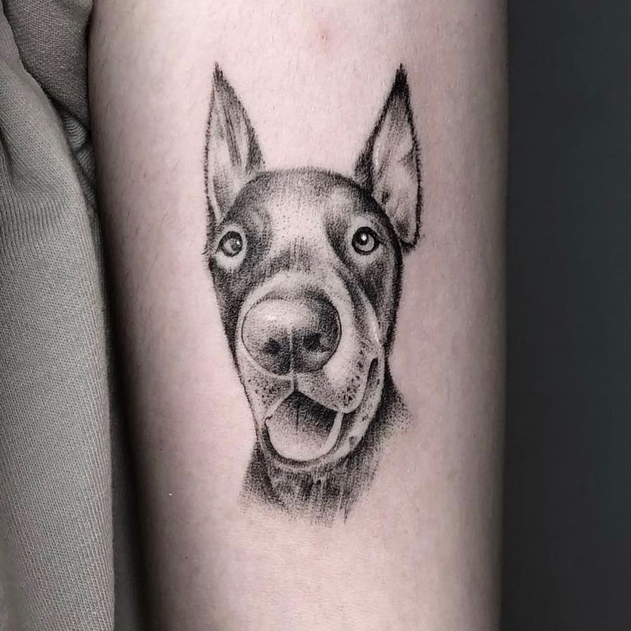 Dog dotwork tattoo on the forearm by Shihao zhao