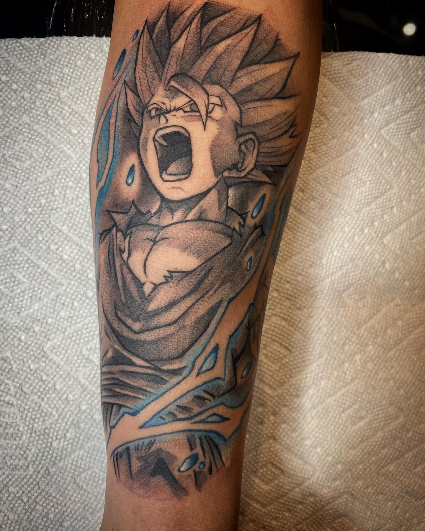 Super saiyan anime tattoo on the forearm by Angel Rodriguez