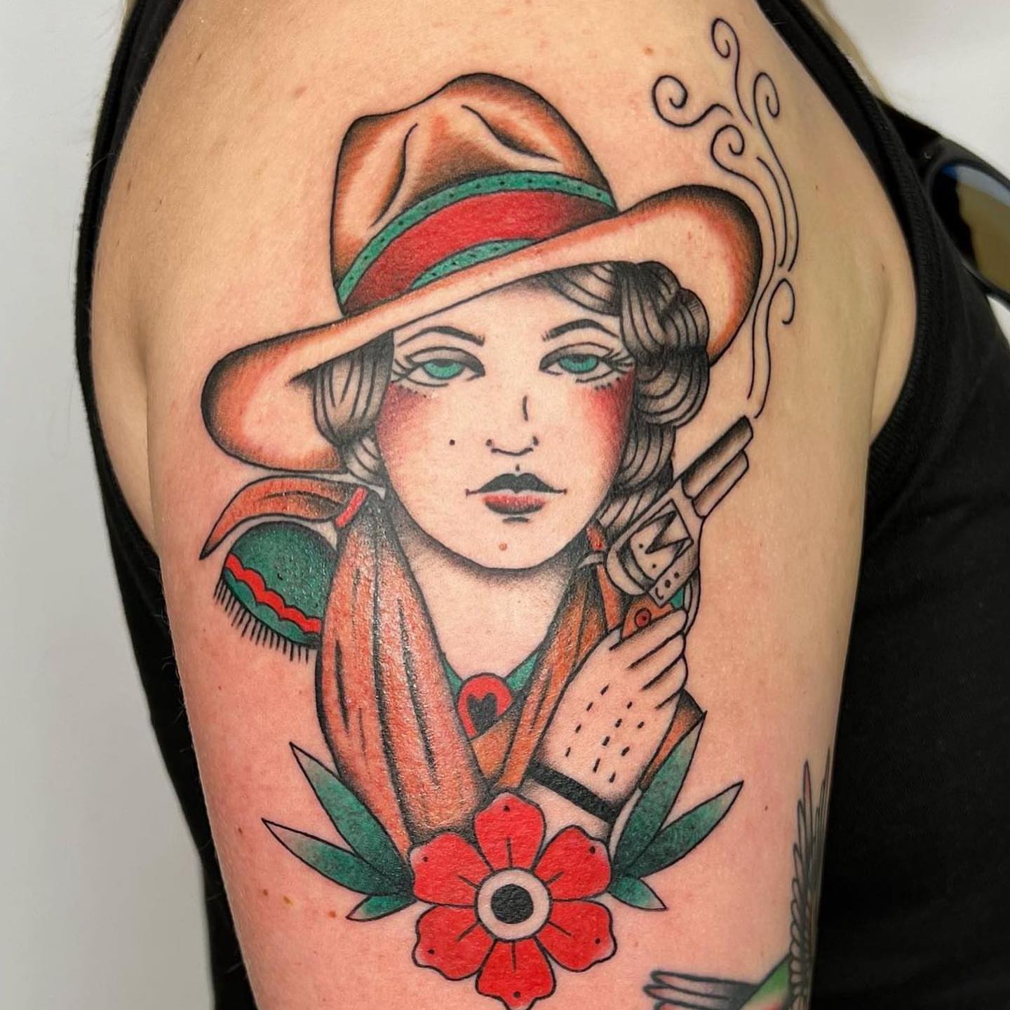 Cowgirl with revolver American traditional tattoo on the shoulder by ⊹ ࣪ ₊✩‧₊˚ 𝖘 𝖙 𝖊 𝖕 𝖍 𝖆 𝖓 𝖎 𝖊 ˚₊‧✩₊ ࣪ ⊹