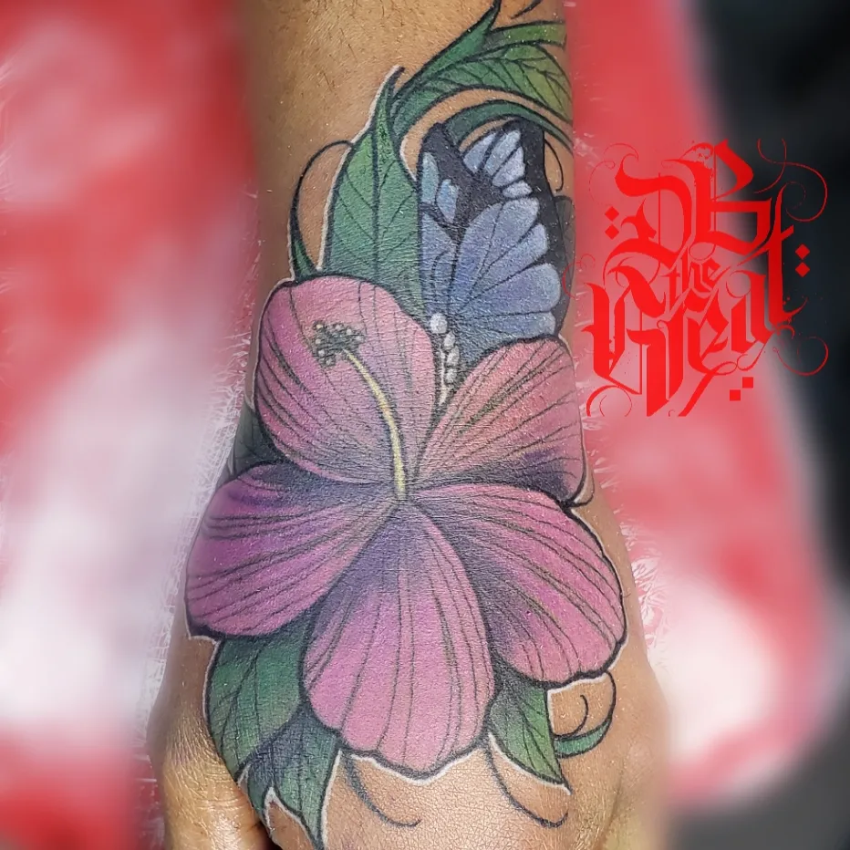 Flower realism tattoo on the forearm by Dannie Blythewood