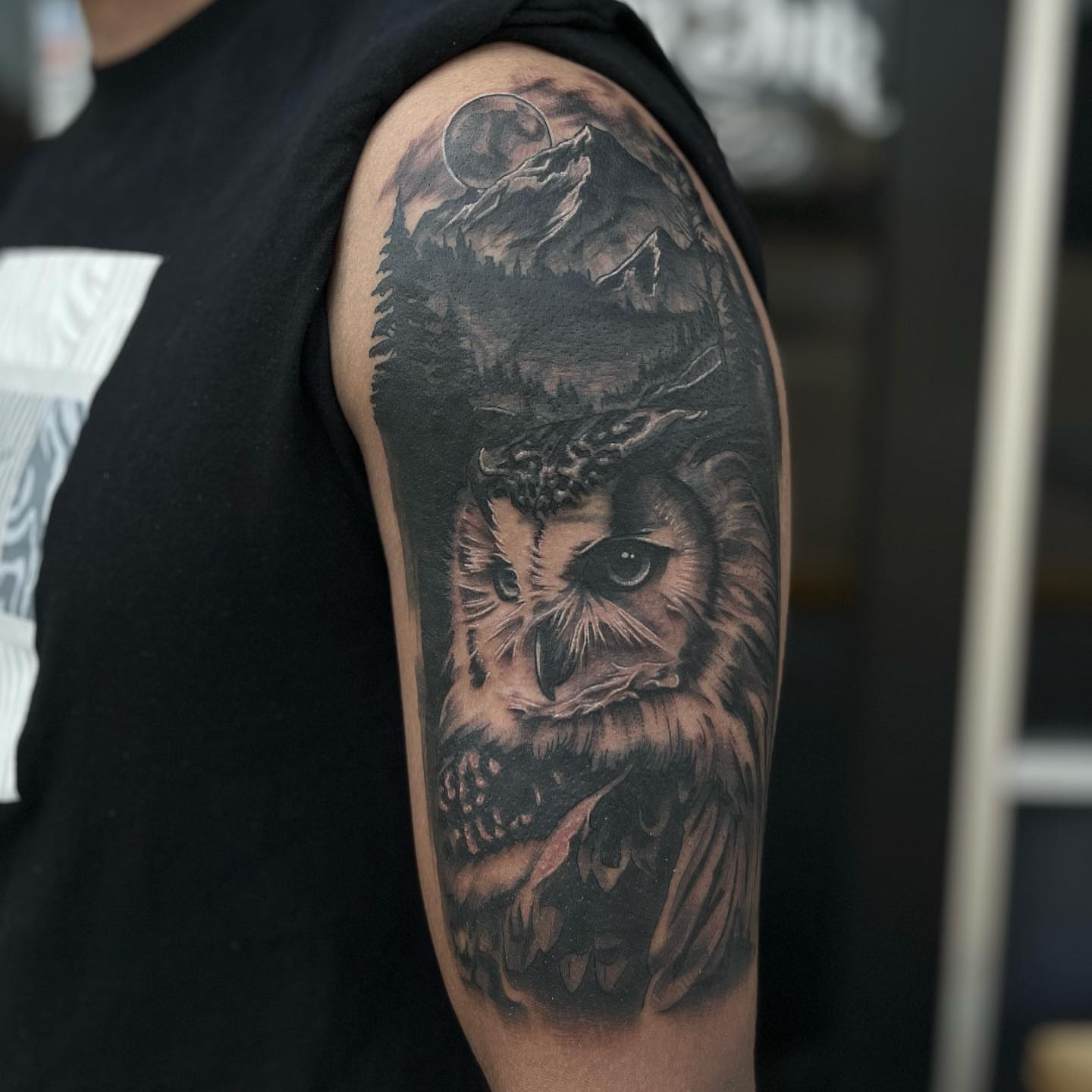Owl realism tattoo on the upper arm by Myla Jane, Houston, Texas