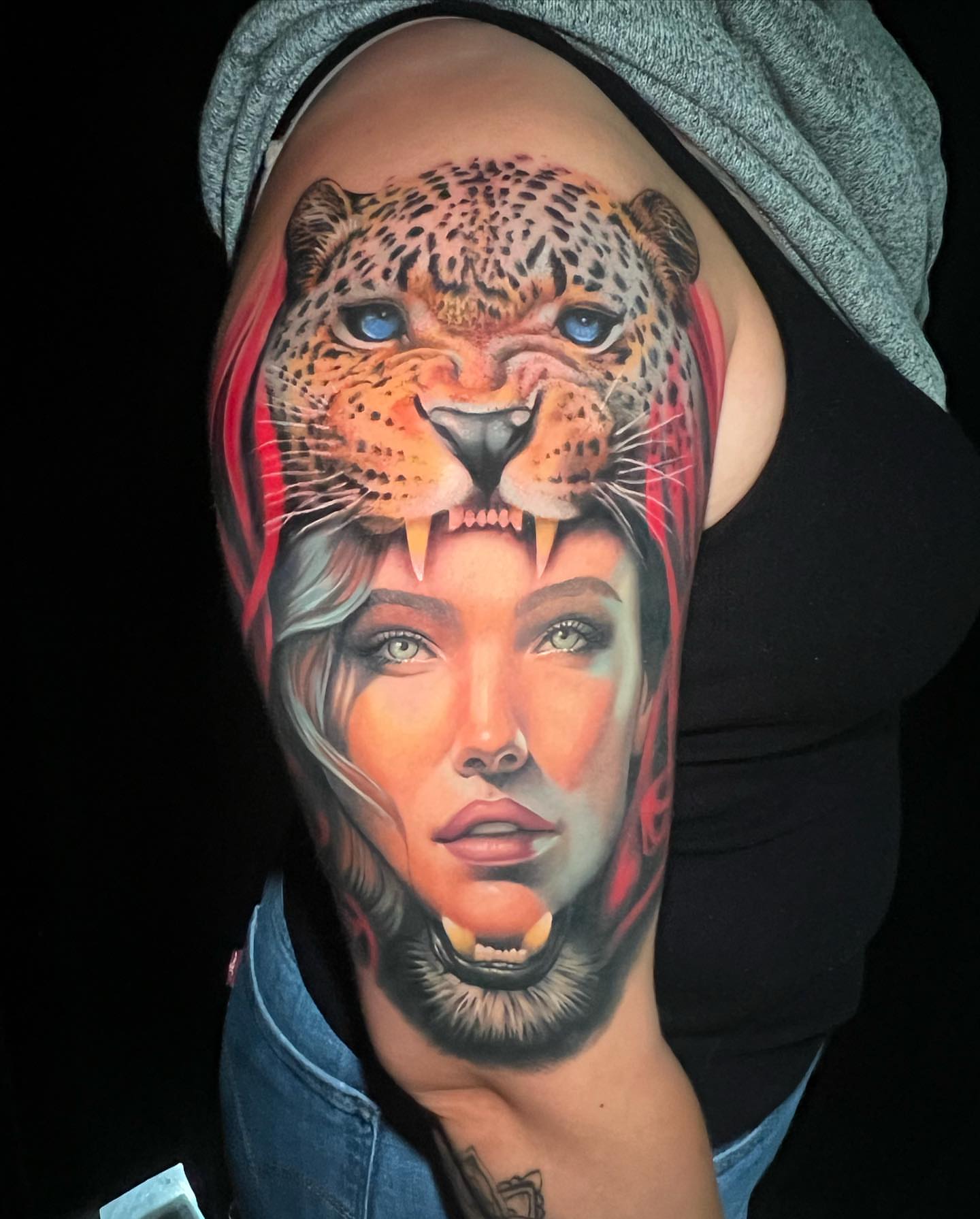 Woman with leopard realism tattoo on the shoulder by Mary Blake Tattoos, Franklin, Tennessee