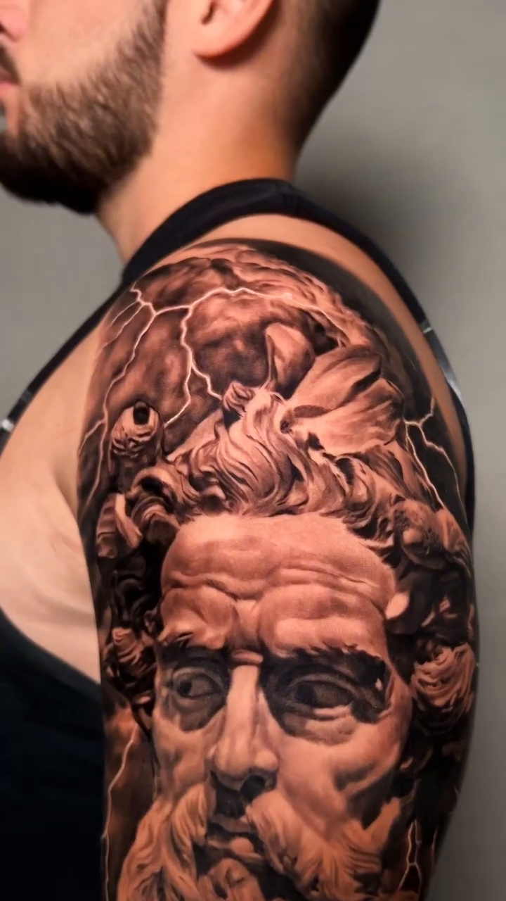 Bust of Zeus realism tattoo by Giona Starace