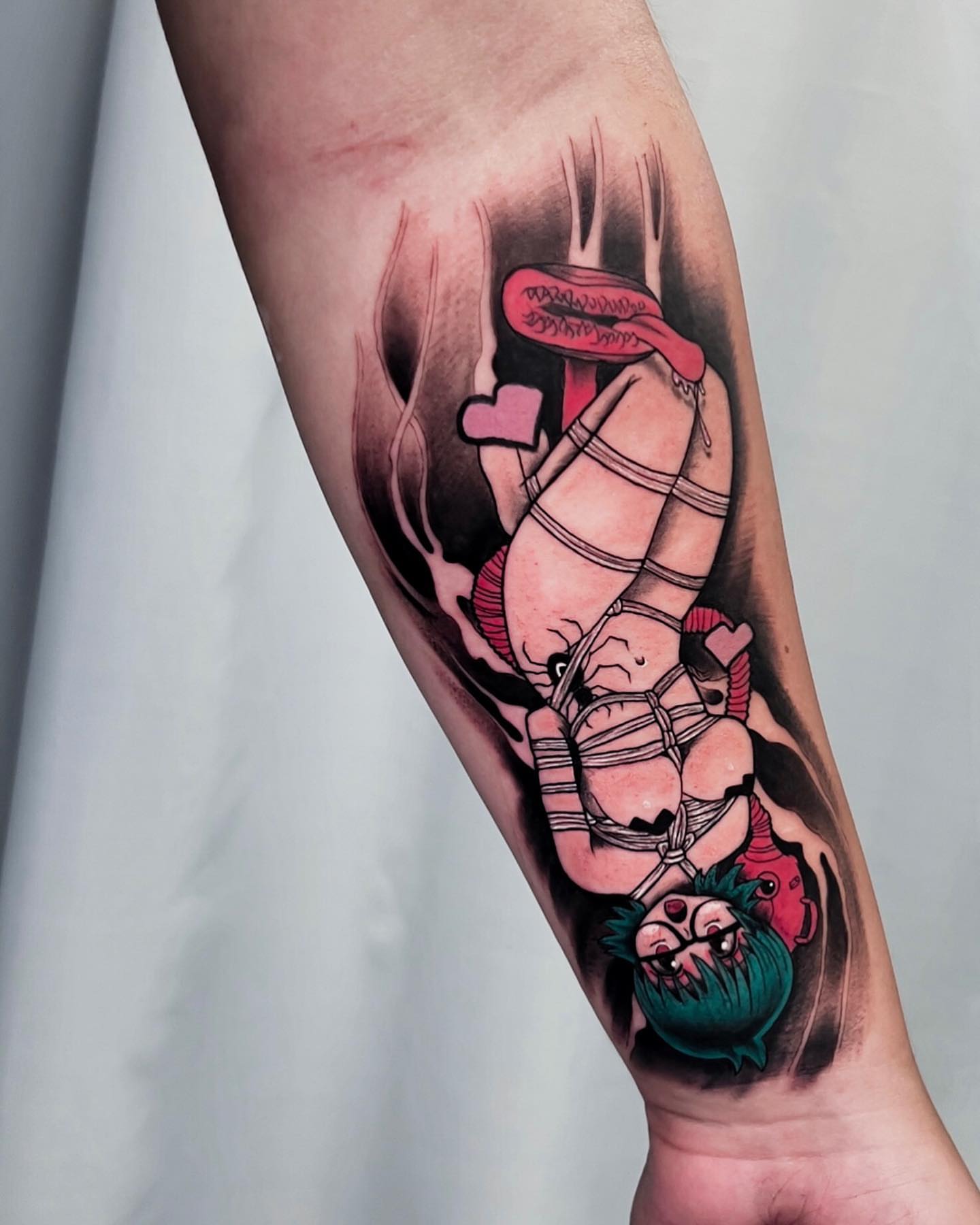 Bound woman American traditional tattoo on the forearm by Matthew Diaz