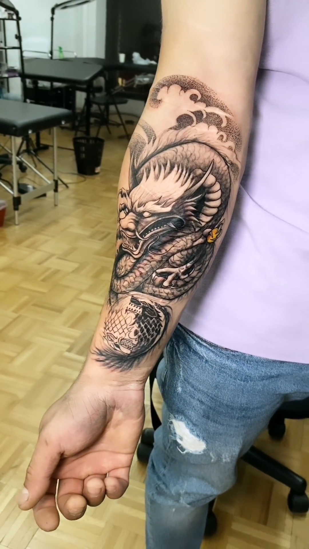 Dragon with waves japanese irezumi tattoo by Ivan Grinevich