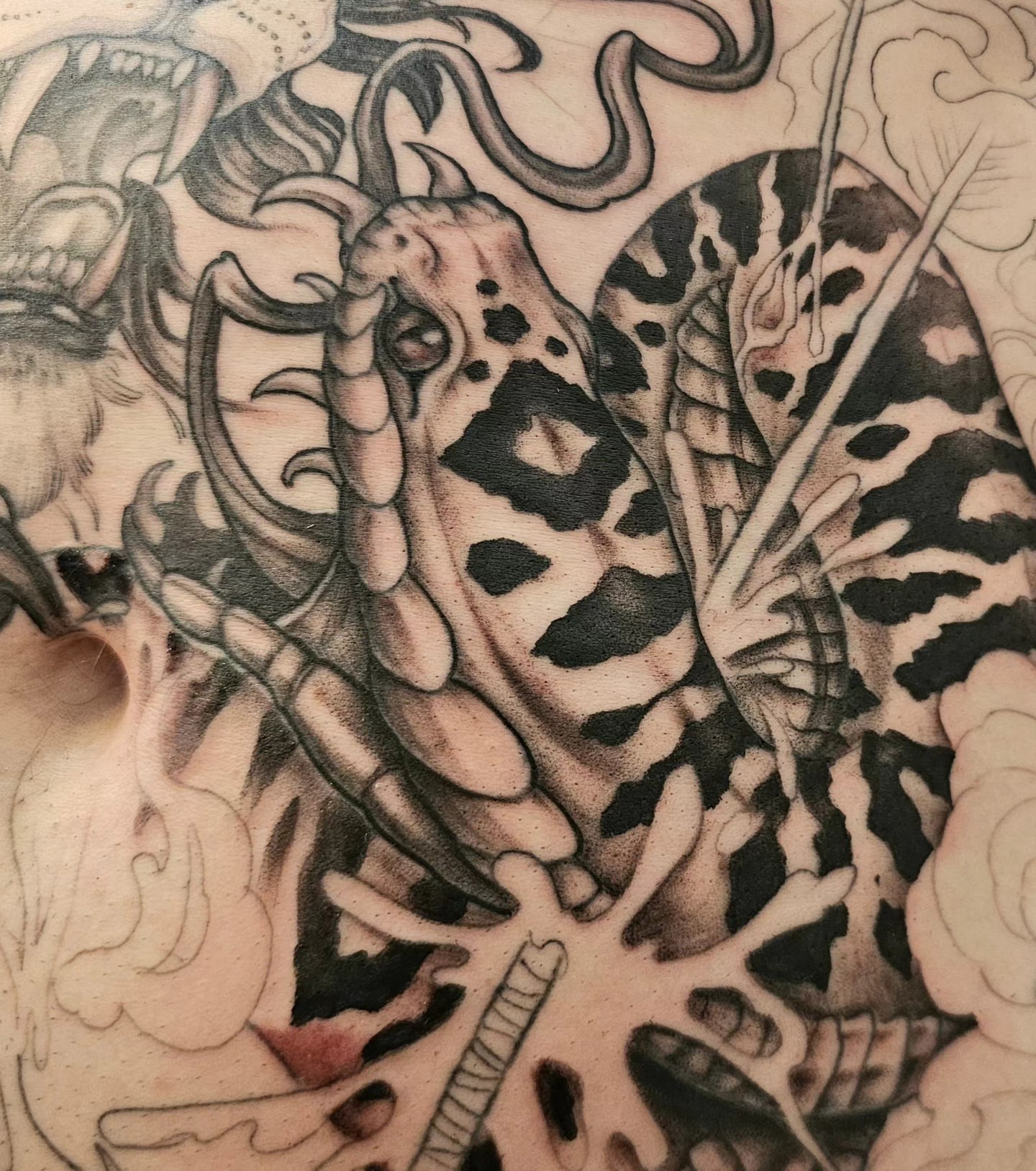 Tattoo by @erinrietzetattoo — black_and_grey