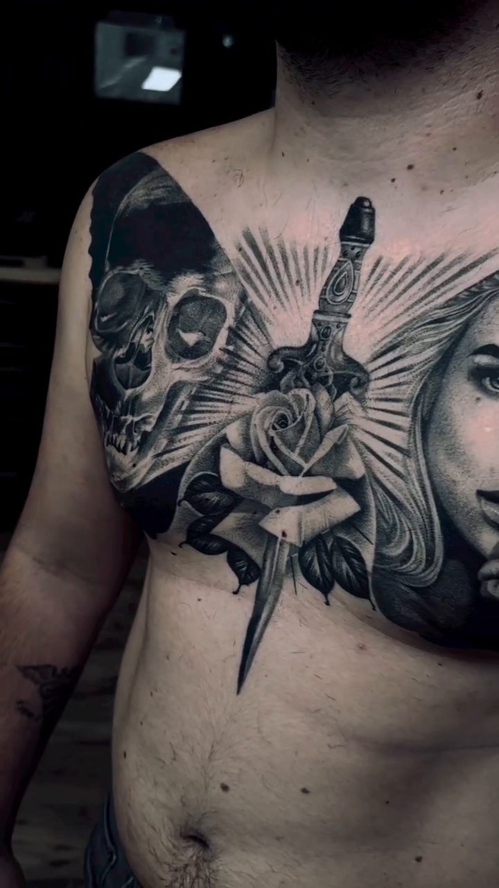 Skull, rose, dagger, and portrait realism tattoo by DH Tattooing
