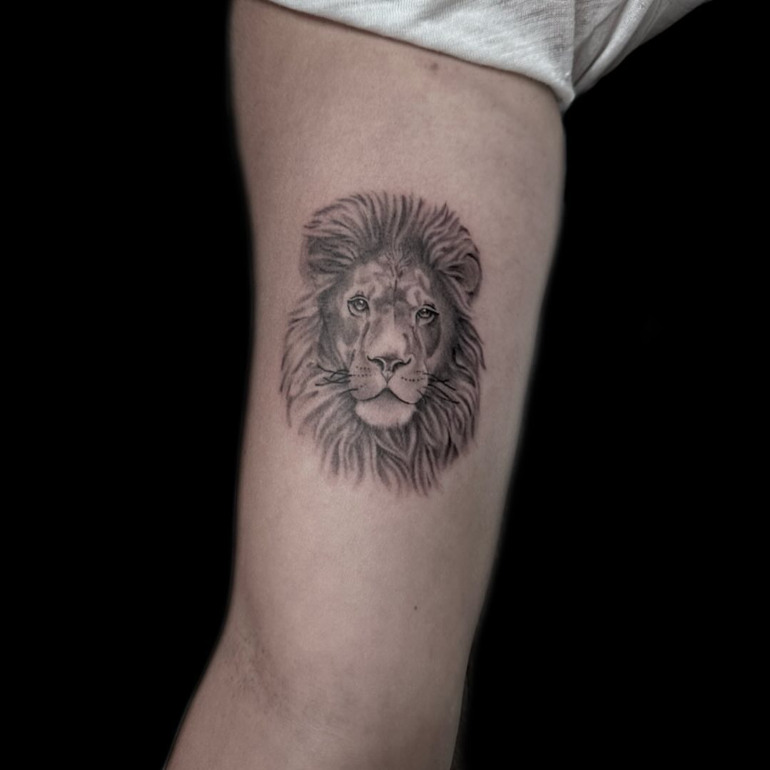Lion realism tattoo on the forearm by Blake Owens, Nashville, Tennessee