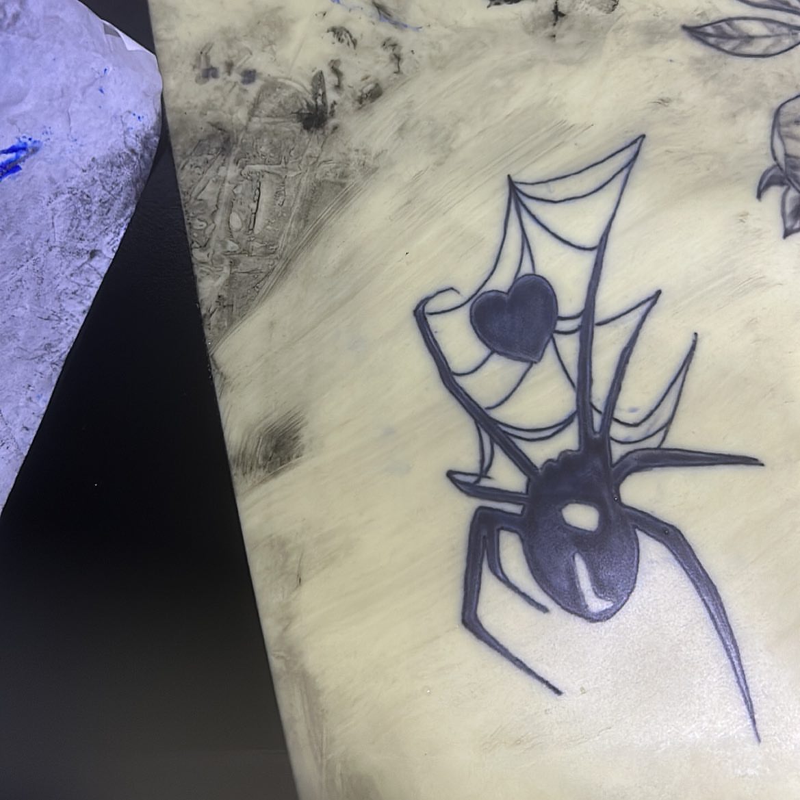 Spider with heart black and grey tattoo on the forearm by ๐ฆ