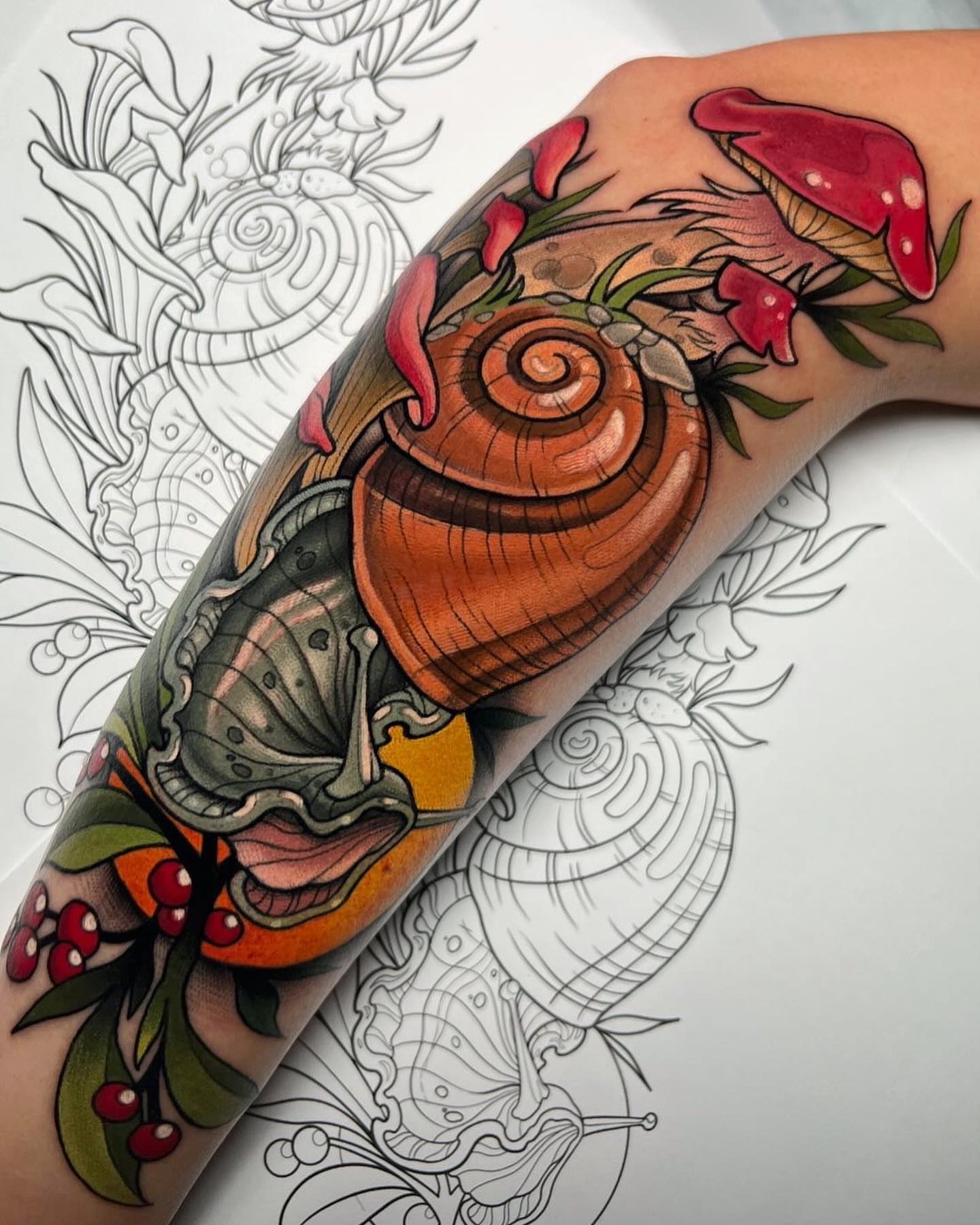 Snail and mushrooms American traditional tattoo on the forearm by James Boag