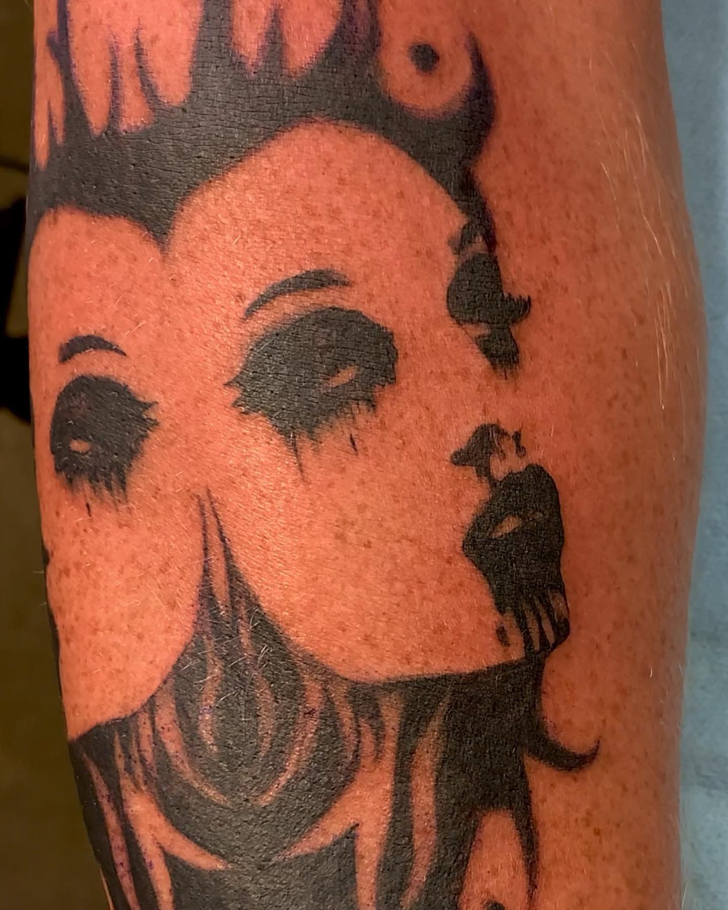 Woman black and grey tattoo on the forearm by Maddy Paige