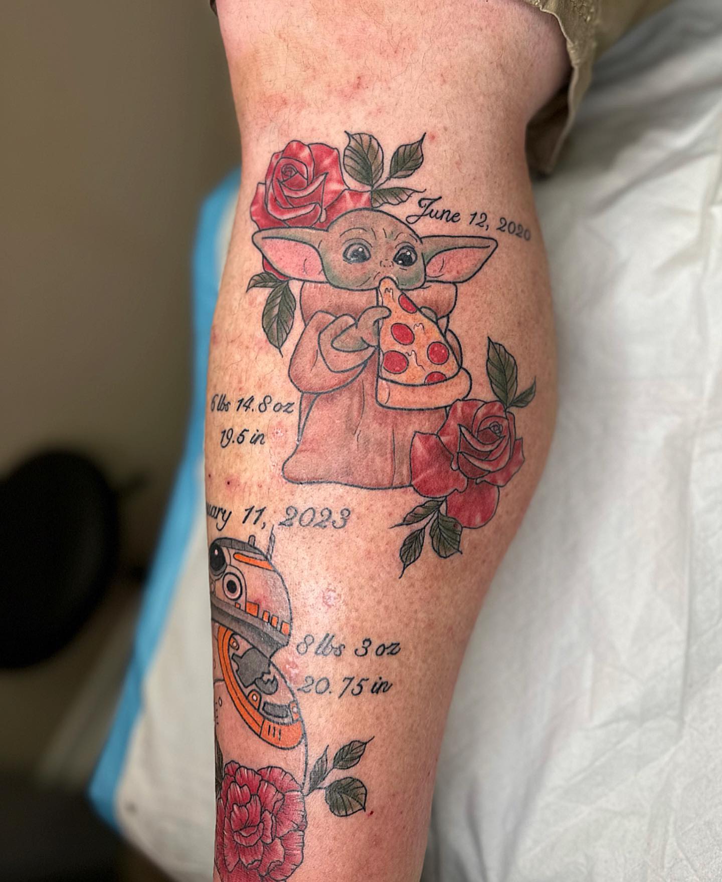 Baby Yoda with pizza American traditional tattoo on the thigh by Diana Kunz