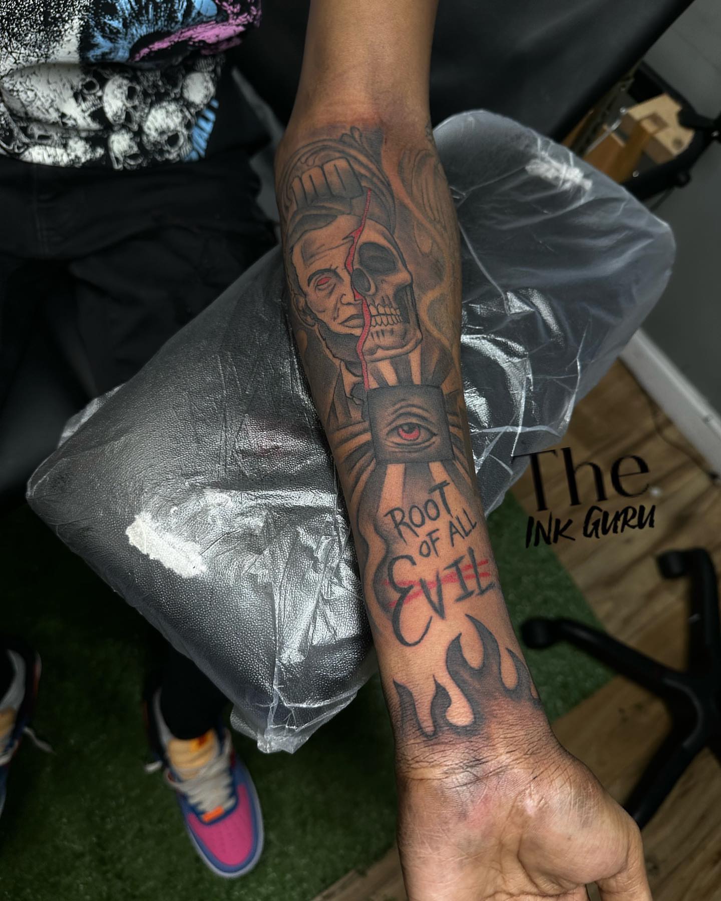Skull and eye American traditional tattoo on the forearm by The Ink Guru.