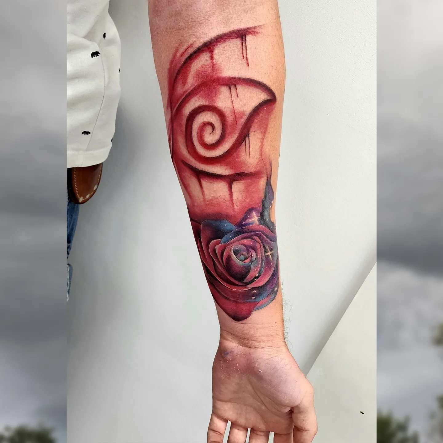 Rose and eye realism tattoo on the forearm by Diane Maya