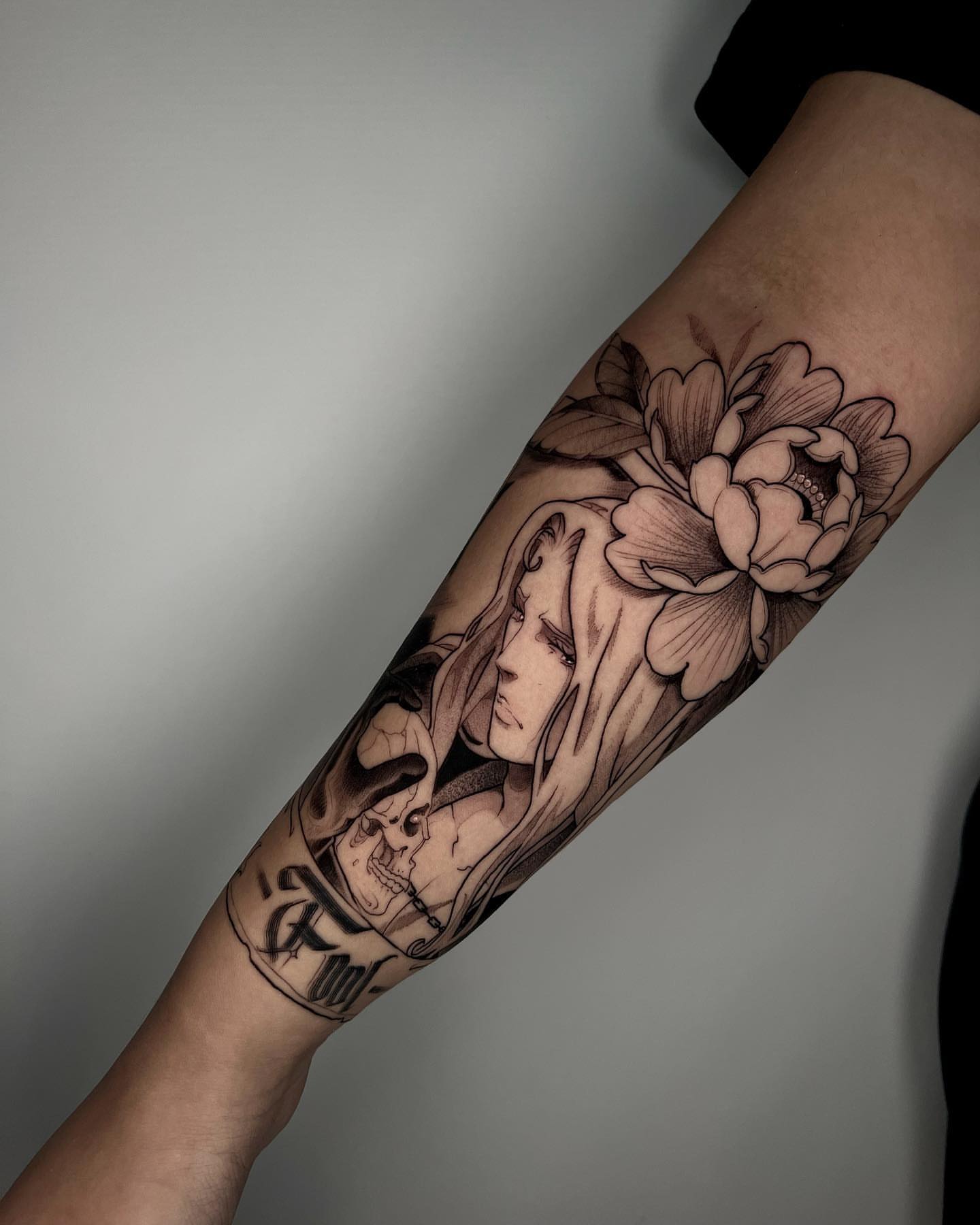 Woman with flowers realism tattoo on the forearm by Angelo Buonanno, Las Vegas, Nevada