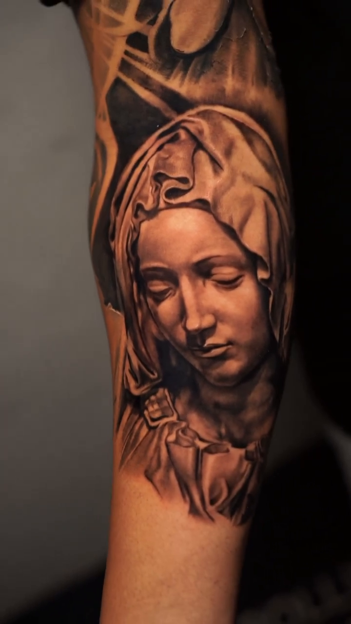 Virgin Mary portrait realism tattoo by Giona Starace