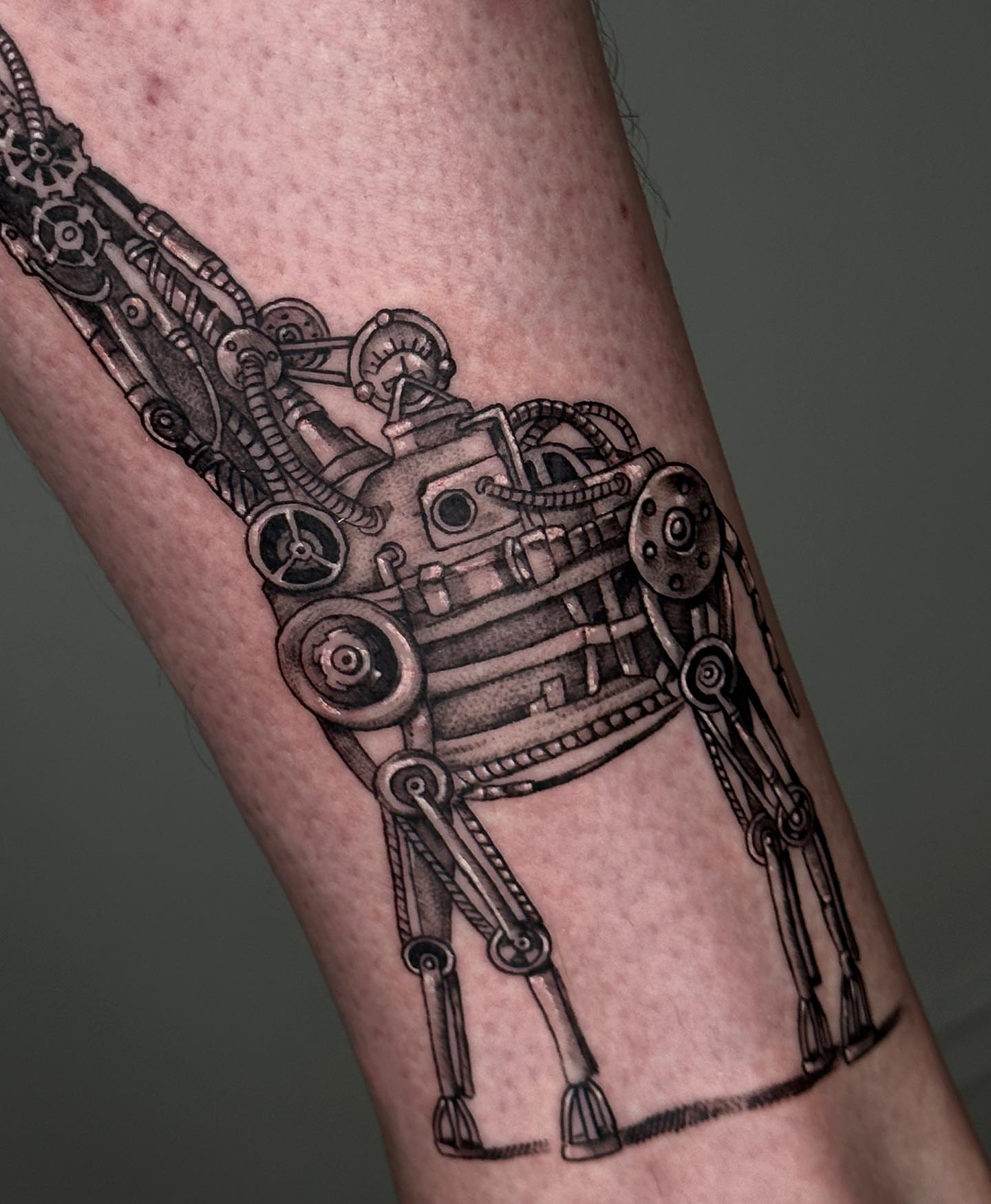 Mechanical robot geometric tattoo on the forearm by A L e X