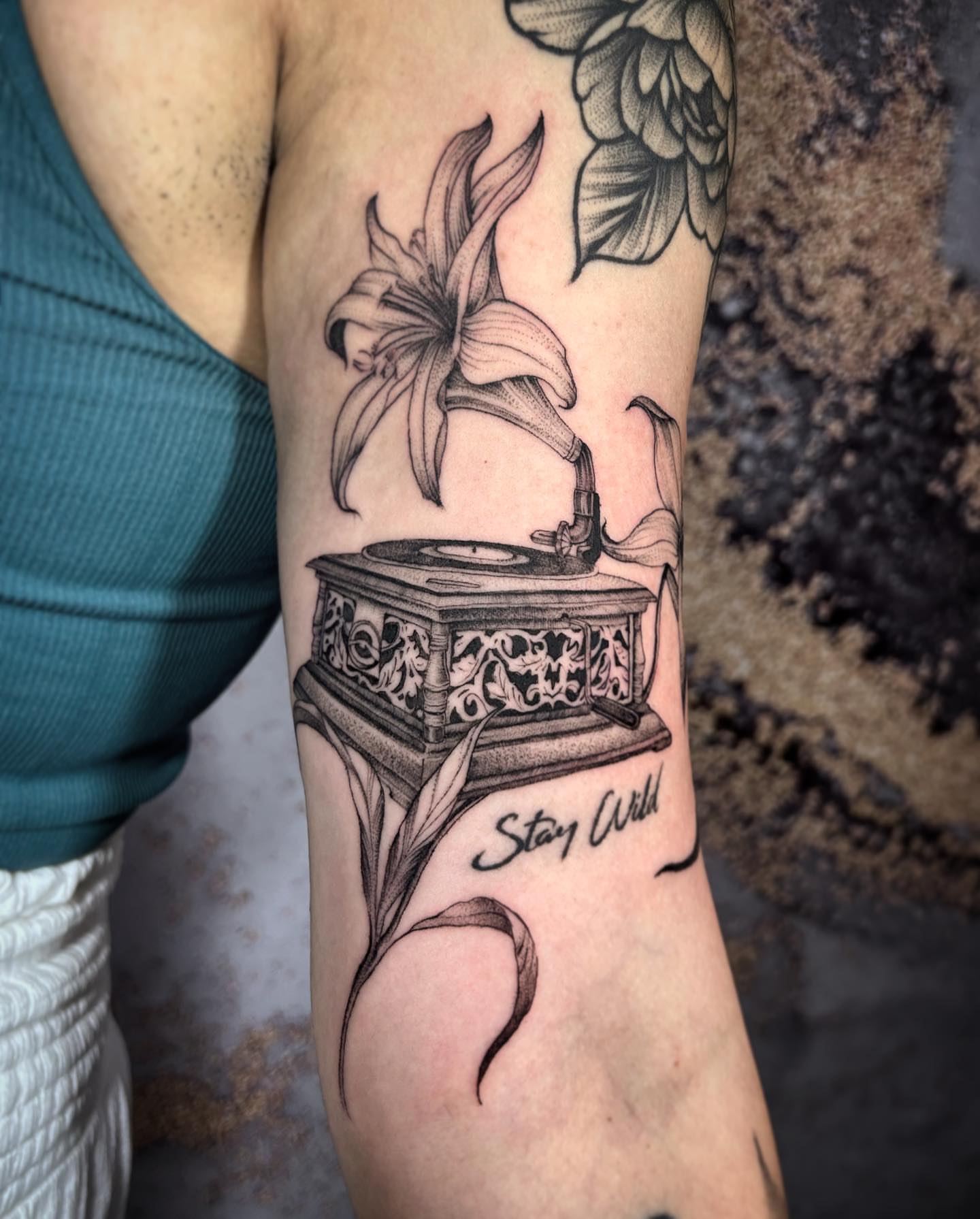 Tattoo by @c.x.dotline — black_and_grey, realism