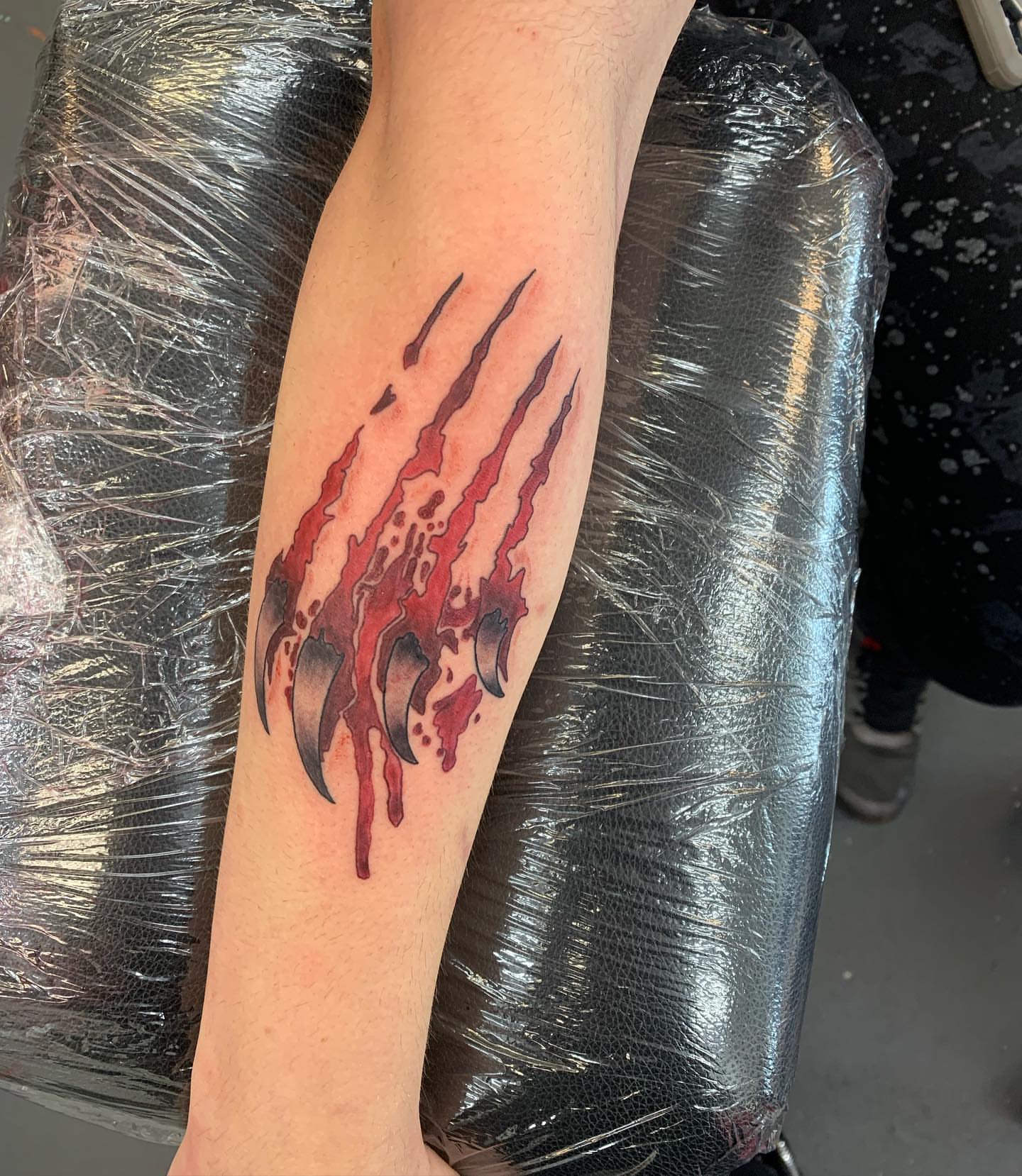 Claw marks dotwork tattoo on the forearm by kylie